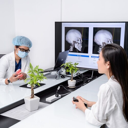 Vix Dental Clinic, Ho Chi Minh City, Vietnam- Dentist discussing with patient