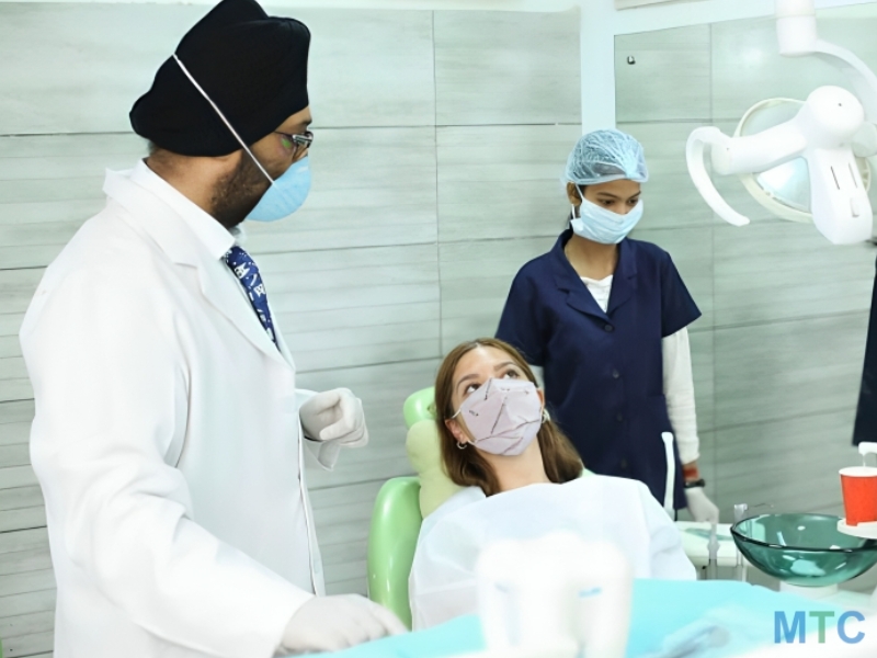 Dr. Tanvir Performing Dental Treatment