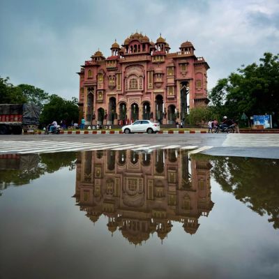 reflection of patrika gate in the water in monsoon in Jaipur