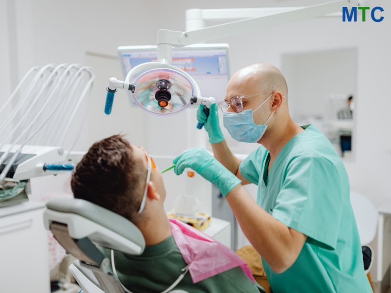 Dentist with patient